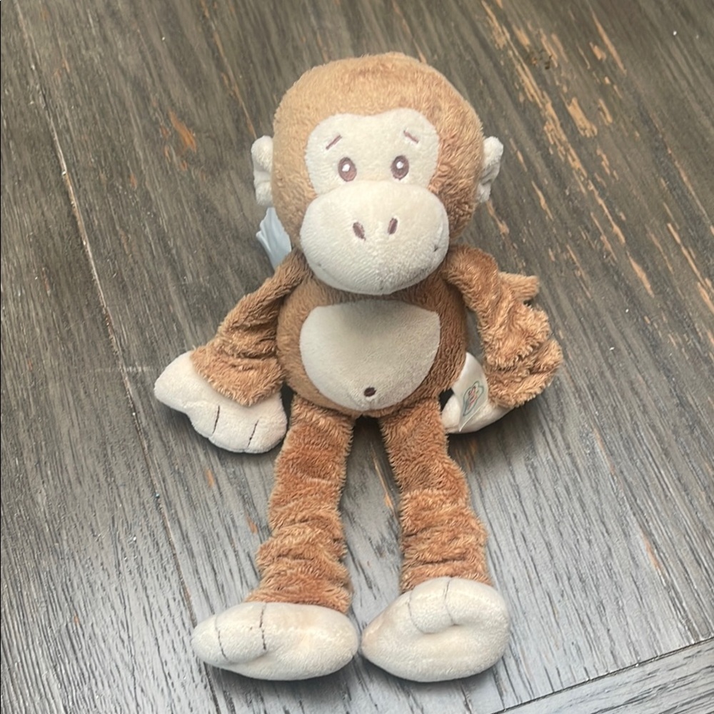 Brown and Cream Stuffed Monkey Toy with Floppy Limbs